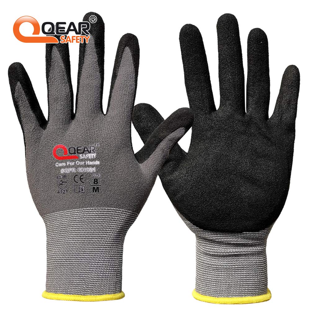 Dexterous QearSafety 15-gauge touchscreen-compatible safety gloves with sandy nitrile grip for wet and oily applications.