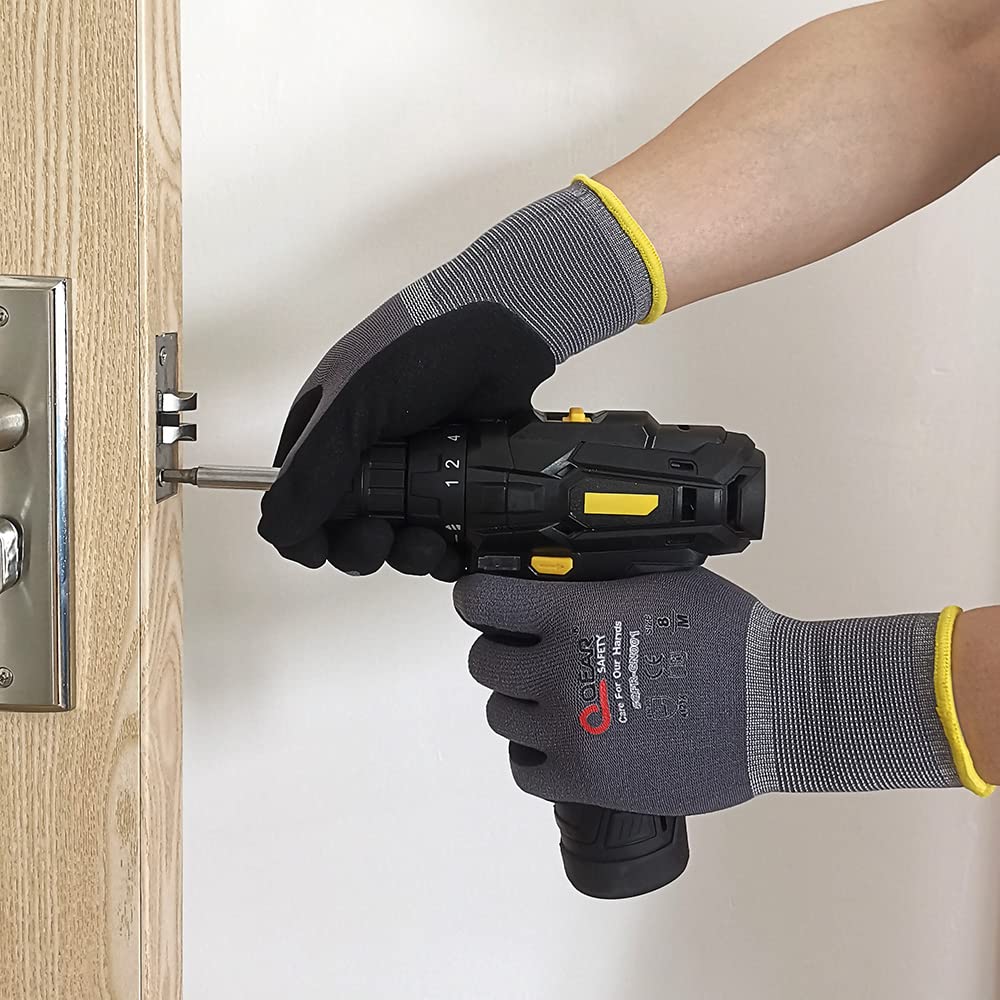 Dexterous QearSafety 15-gauge touchscreen-compatible safety gloves with sandy nitrile grip for wet and oily applications.