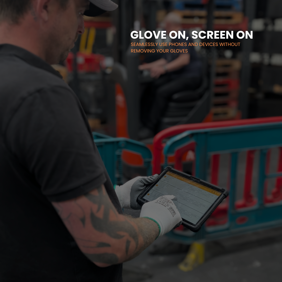 Person using a tablet with gloves on in an industrial setting
